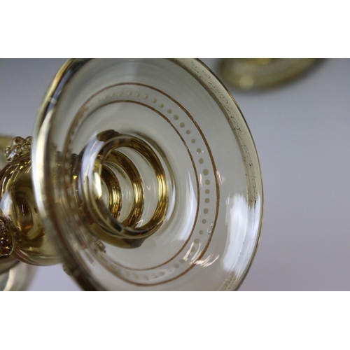 42 - Set of six Bohemian green ground hock glasses with enamelled floral decoration and roundels