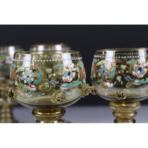 42 - Set of six Bohemian green ground hock glasses with enamelled floral decoration and roundels