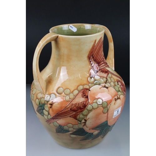 5 - Moorcroft Large Twin Handled Vase decorated in the Fruits and Finches pattern on Ochre ground, impre... 