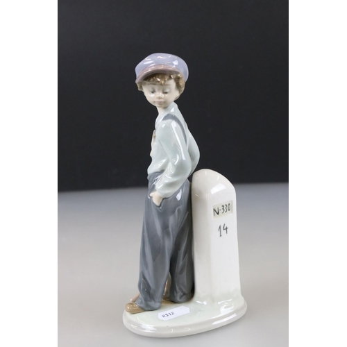 54 - Two Lladro Models including Boy with Knapsack, 21cm high and ' Bashful Bather ' model 5455