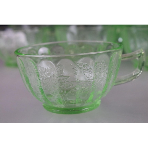 60 - Uranium Glass - Eleven Cups and Nine Saucers