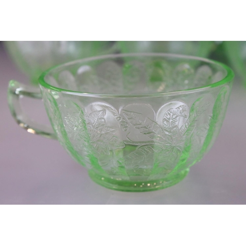 60 - Uranium Glass - Eleven Cups and Nine Saucers