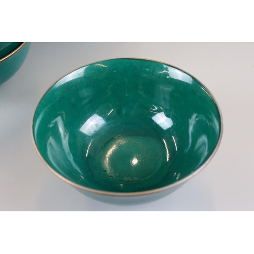 67 - Eleven Chinese Green Glazed Plates with Gold Rim together with Eleven matching Bowls, red character ... 