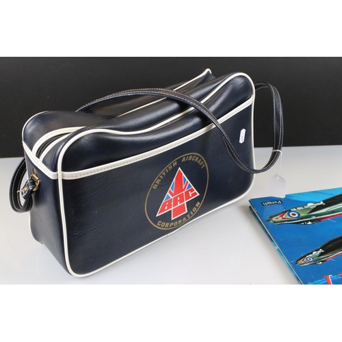 347 - A British Aircraft Corporation advertising shoulder bag together with associated book and drinks coa... 