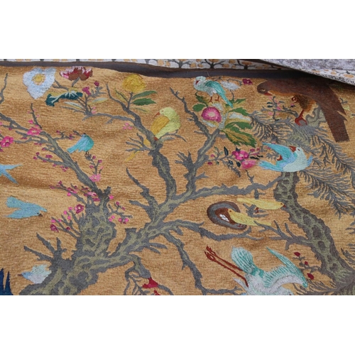 348 - A large hanging tapestry of exotic birds with floral background.