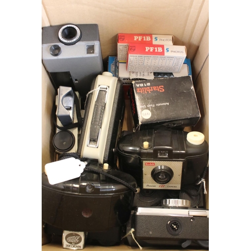 371 - A large collection of cameras to include Kodak, Zenit and Agfa examples