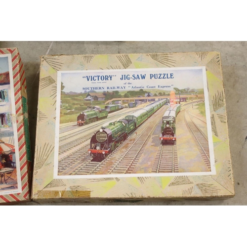 376 - A large collection of early to mid 20th century wooden Victory jigsaw puzzles.