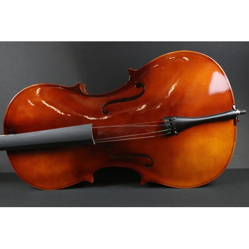 383 - A contemporary students cello with bow in black gig bag.