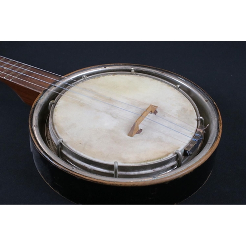 386 - A vintage four string banjolele.