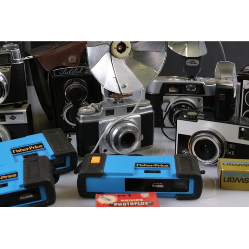 392 - A large collection of cameras to include Kodak, Lubitel and Agfa examples.