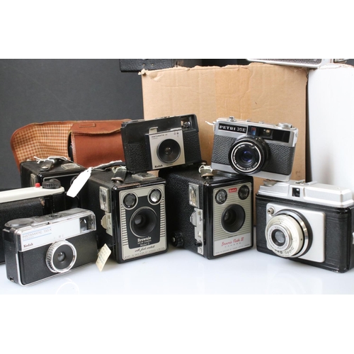 398 - A large collection of cameras to include Kodak, Ilford and Petri examples.