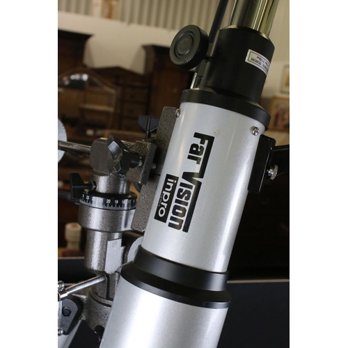 407 - A FarVsion inpro optic telescope and tripod together with two other telescopes.