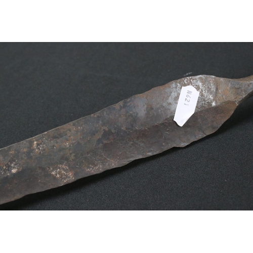 410 - A tribal spear with carved wooden handle.