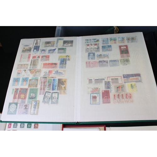 421 - A large collection of mainly world stamps contained within thirteen albums.