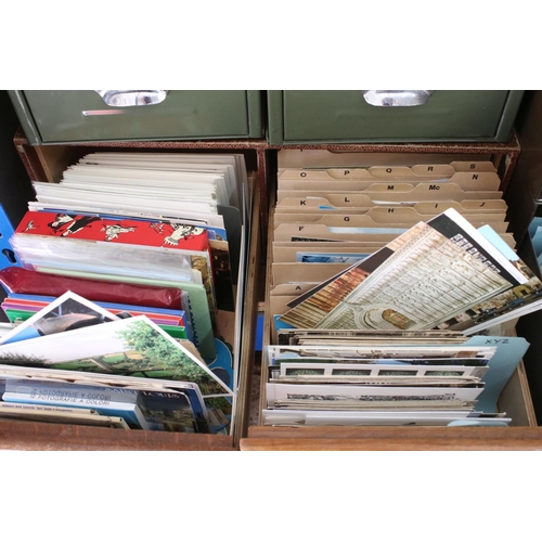 423 - A large collection of postcards contained within drawer files to include Churches and topographical ... 