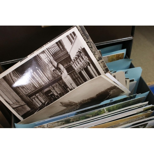 423 - A large collection of postcards contained within drawer files to include Churches and topographical ... 