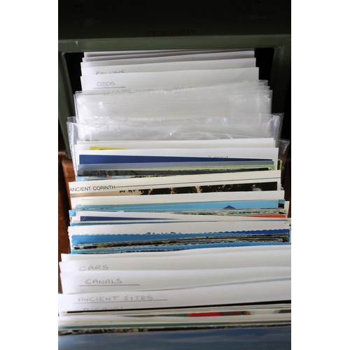 423 - A large collection of postcards contained within drawer files to include Churches and topographical ... 