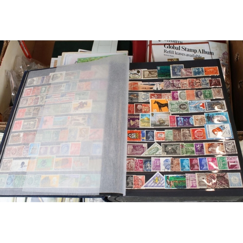 426 - A large collection of mixed stamps to include British, Commonwealth and world examples both mounted ... 