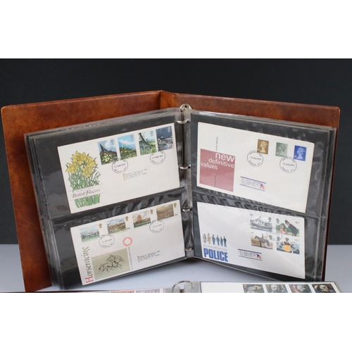 431 - A large collection of mainly British First Day Covers contained within three albums.