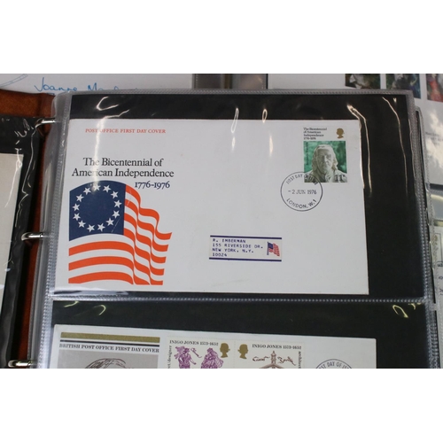 431 - A large collection of mainly British First Day Covers contained within three albums.