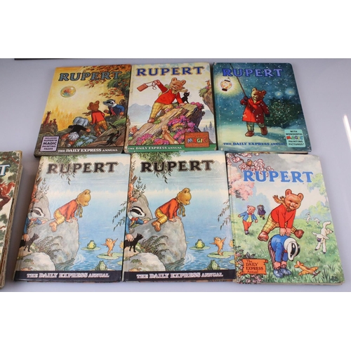 433 - A collection of approx ten Rupert the Bear annuals dating from the 1960's.