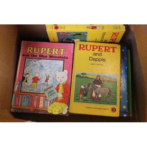 437 - A large collection of Rupert the Bear annuals dating from the 1980's contained within two boxes.