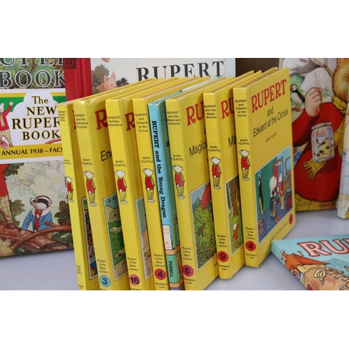 437 - A large collection of Rupert the Bear annuals dating from the 1980's contained within two boxes.