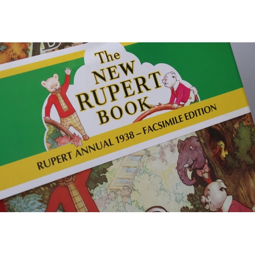 437 - A large collection of Rupert the Bear annuals dating from the 1980's contained within two boxes.