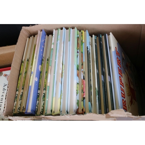 437 - A large collection of Rupert the Bear annuals dating from the 1980's contained within two boxes.