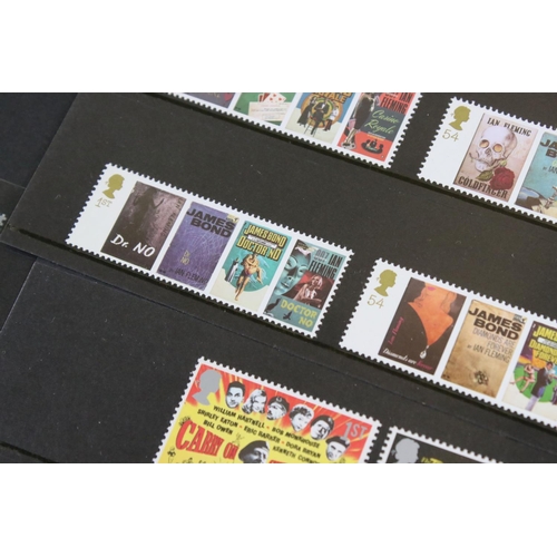 442 - A small collection of British and world stamps contained within albums together with a quantity of m... 