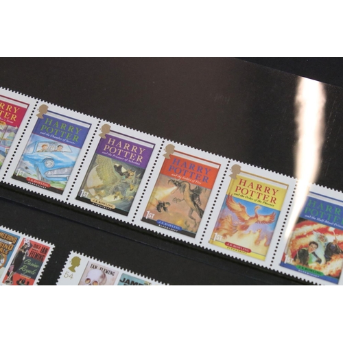 442 - A small collection of British and world stamps contained within albums together with a quantity of m... 