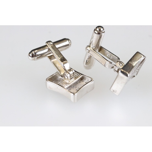 196 - Pair of silver and CZ cufflinks