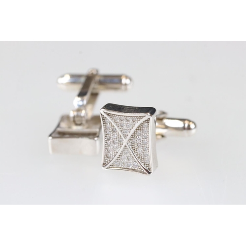 196 - Pair of silver and CZ cufflinks