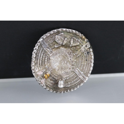 201 - A white metal Saxon period brooch with hammered coin set to centre.