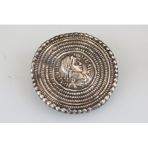 201 - A white metal Saxon period brooch with hammered coin set to centre.