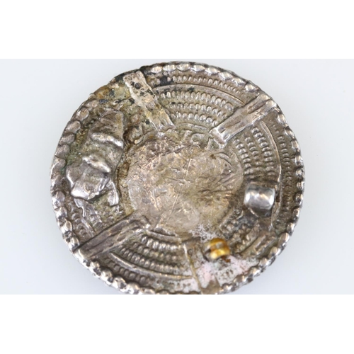 201 - A white metal Saxon period brooch with hammered coin set to centre.