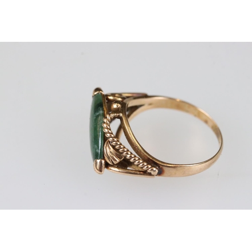 211A - Two ladies 14ct gold rings to include a rose gold dress ring set with jade.