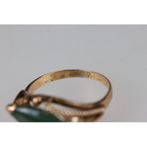 211A - Two ladies 14ct gold rings to include a rose gold dress ring set with jade.