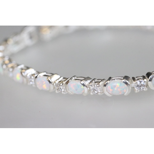 212 - Silver CZ and opal panelled bracelet