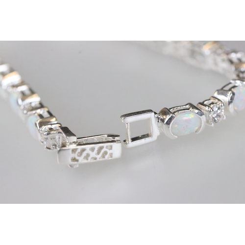 212 - Silver CZ and opal panelled bracelet