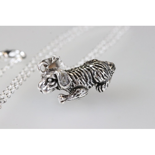 213 - Silver articulated dog pendant necklace