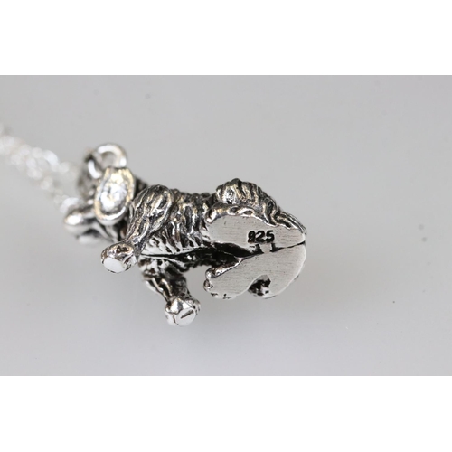 213 - Silver articulated dog pendant necklace