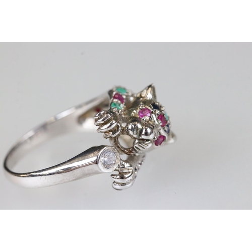 219 - Silver panther ring set with semi precious stones