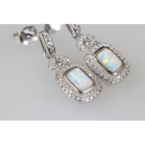 224 - Pair of silver CZ and opal earrings