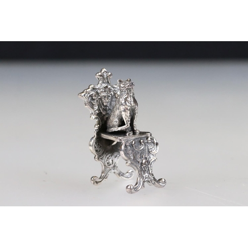 233 - Unusual silver cat on a throne