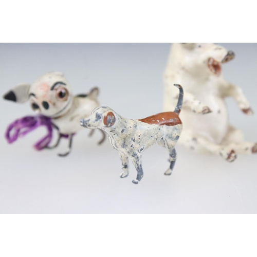 256 - A small collection of miniature figures to include cold painted animals.