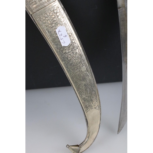 257 - White metal Persian dagger with curved blade and scabbard