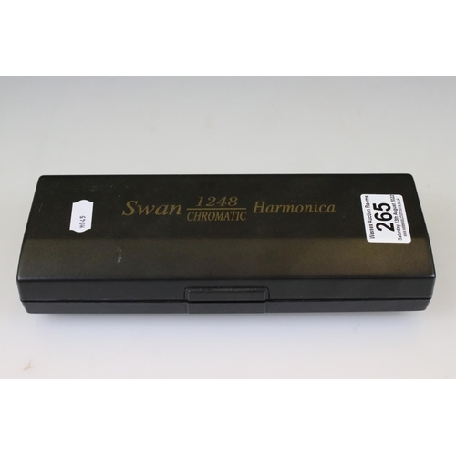 265 - A cased Swan chromatic 1248 harmonica.