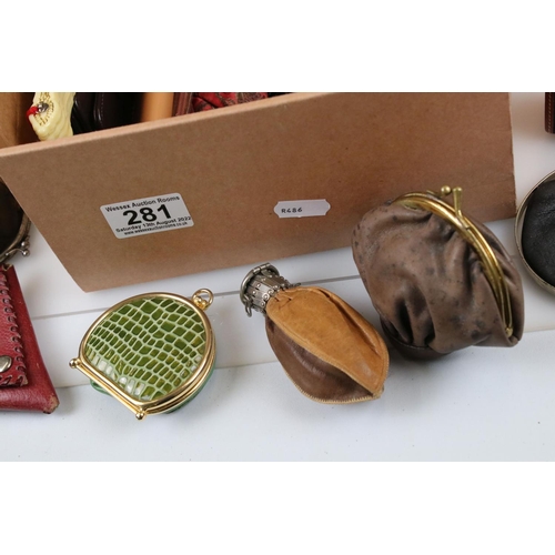 281 - A collection of vintage handbags, purses and fans.