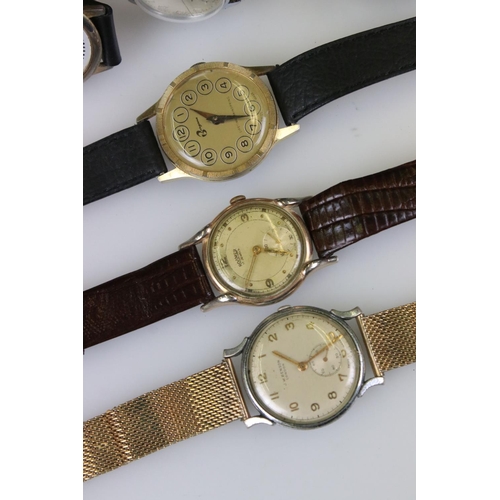 299 - A small collection vintage gents watches to include Smiths Empire, J.W. Benson, Roamer and Oris exam... 